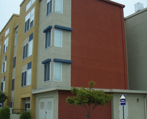 A red, grey, and yellow building